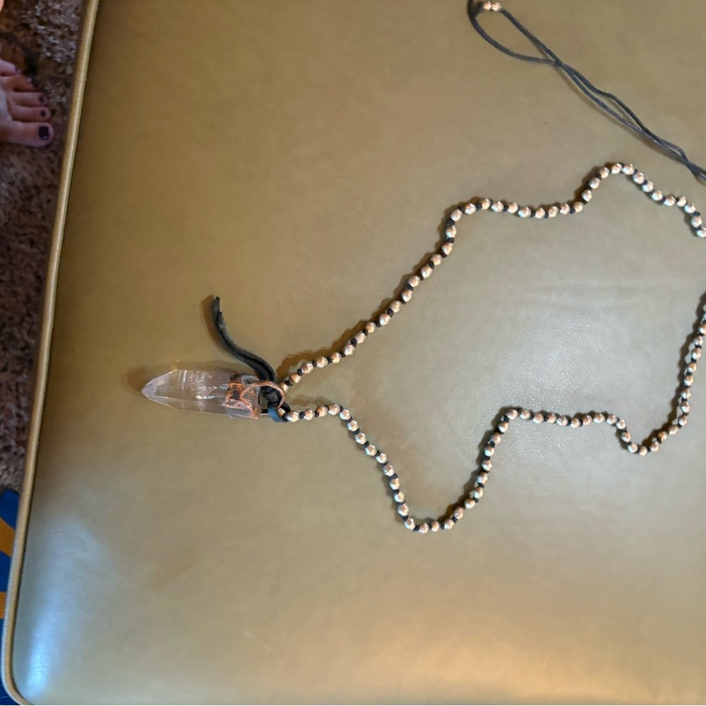 Crystal Pendant Beaded Necklace
About 22 inches long
